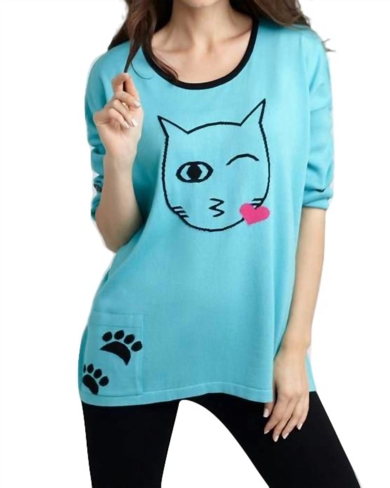 Front of a model wearing a size LG Cat Kiss Graphic Sweater in Turquoise/Black in Turquoise/Black by ANGEL. | dia_product_style_image_id:325740